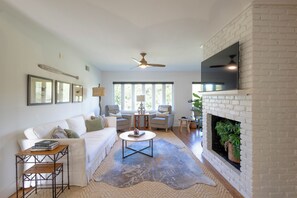 Smart TV, fireplace, books
