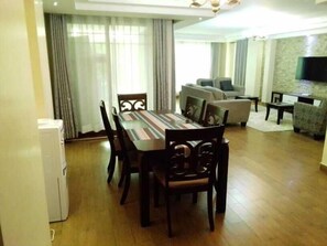 Appartement | Aire de séjour | Téléviseur