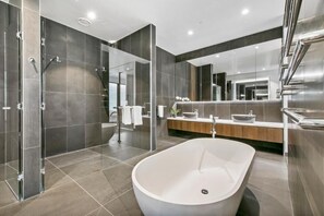 Separate bathtub and shower, free toiletries, hair dryer, towels