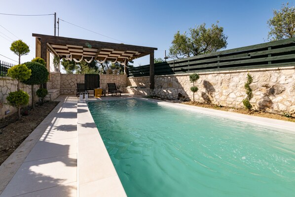 Seasonal outdoor pool, pool umbrellas, sun loungers