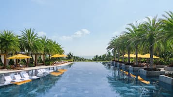 3 piscines extérieures, cabanons gratuits, parasols de plage