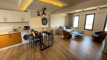 Deluxe Duplex, Kitchen, Sea View | Living area | 43-inch Smart TV with satellite channels, TV, Netflix