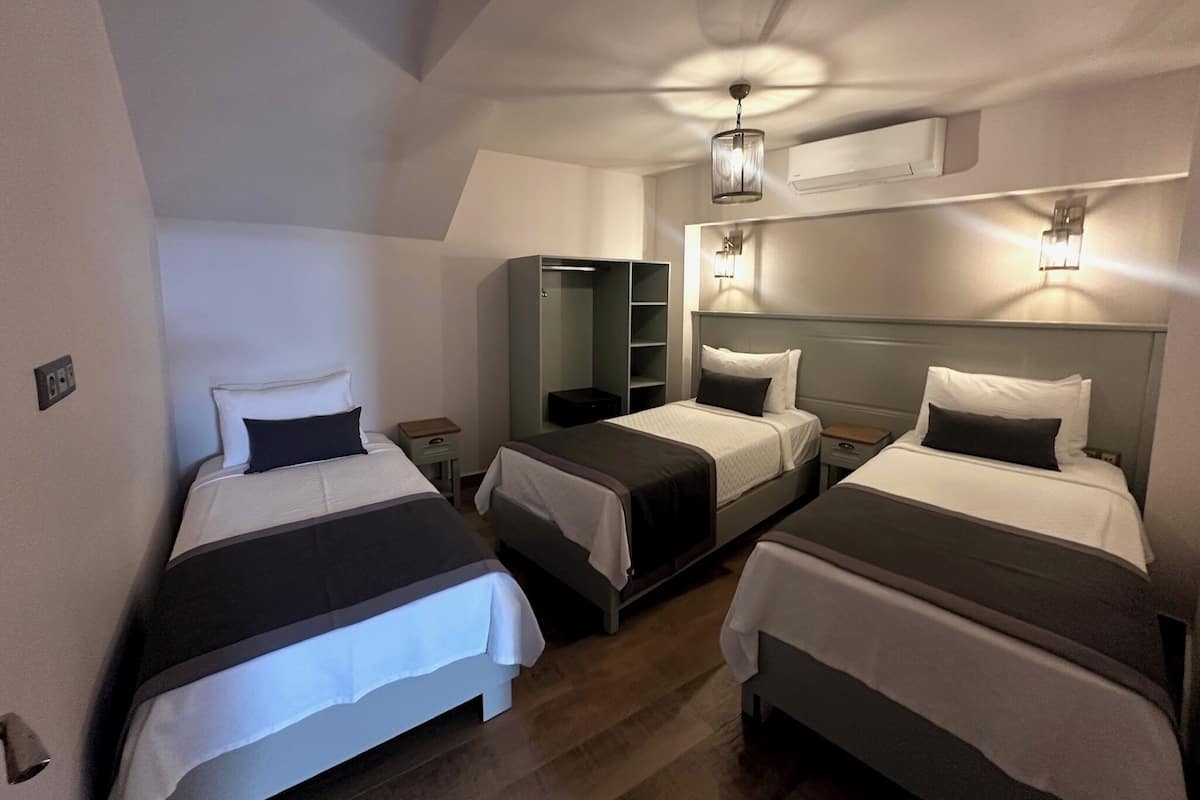 Superior Triple Room, Garden View, Garden Area | In-room safe, free WiFi, bed sheets
