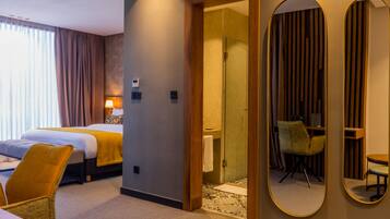 Suite ejecutiva, 1 habitación, vista al jardín | 1 habitación, ropa de cama de alta calidad y minibar