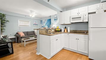 Fridge, microwave, stovetop, coffee/tea maker