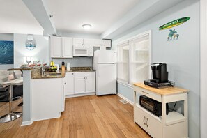 Fridge, microwave, stovetop, coffee/tea maker