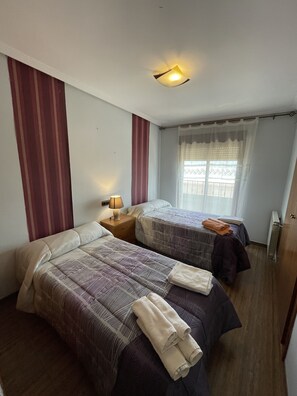 2 bedrooms, iron/ironing board, WiFi, bed sheets