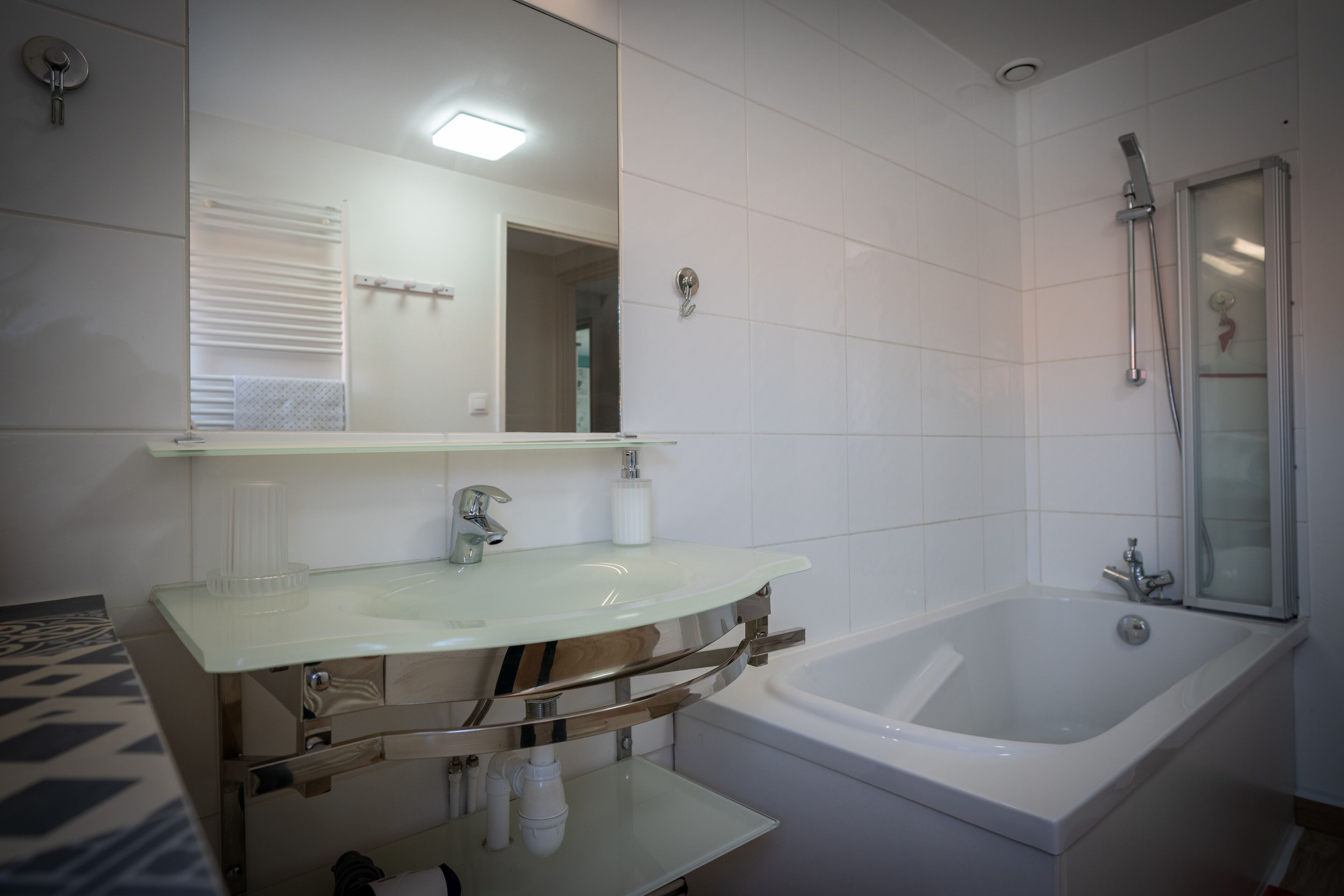 Combined shower/tub, hair dryer, towels, toilet paper