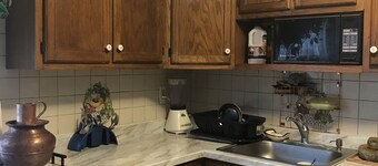 It’s 2 level and  3 bedroom townhome with kitchen and living room.