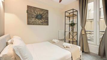 1 bedroom, iron/ironing board, travel crib, bed sheets