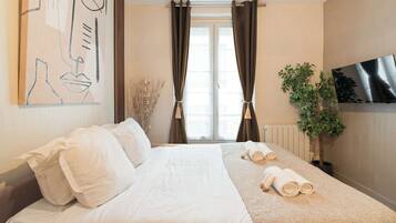 1 chambre, fer et planche Ă repasser, draps fournis