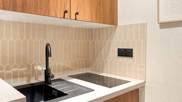 Fridge, microwave, stovetop, coffee/tea maker