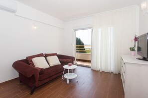 Appartement, plusieurs lits | Salle de séjour