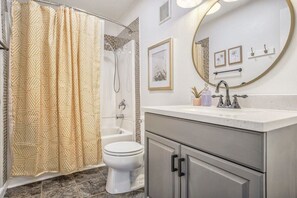 Bathtub, hair dryer, towels