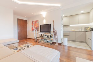 1 bedroom, desk, iron/ironing board, travel crib