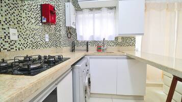 Fridge, microwave, stovetop, cookware/dishes/utensils