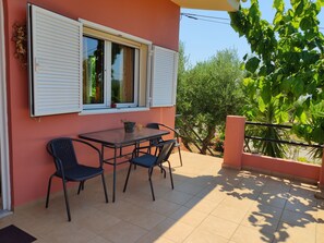 Outdoor dining - Cretan Rural Living in Olive Grove Cottage (Chania)