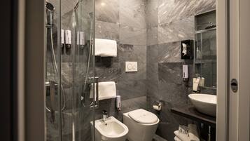 Superior Room | Bathroom | Shower, rainfall showerhead, designer toiletries, hair dryer
