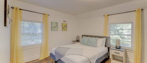 1 bedroom, desk, iron/ironing board, travel crib