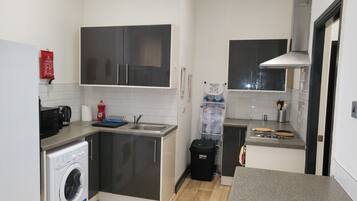 Apartment, 2 Queen Beds | Private kitchen | Fridge, microwave, oven, stovetop