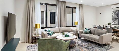 Apartment | Living area | 65-inch LCD TV with digital channels, TV