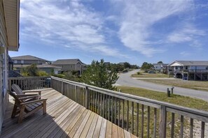 Relax on the deck with a view of the surrounding neighborhood.