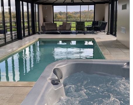 Indoor pool, a heated pool, sun loungers. Le Haras D'havetot