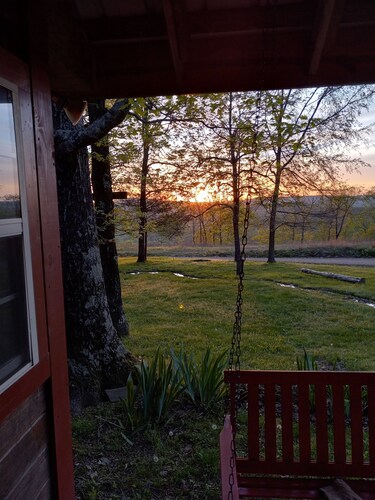 Rustic log cabin in the woods with great sunset views