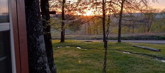 Rustic log cabin in the woods with great sunset views