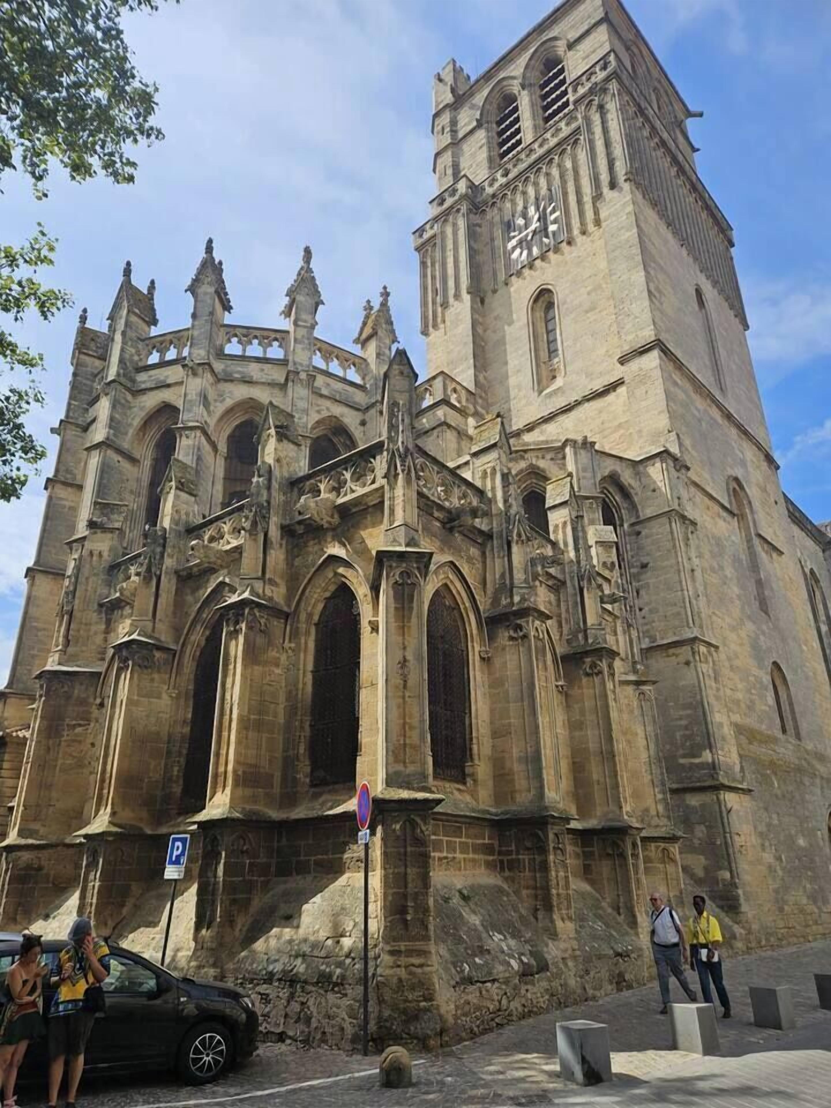A historic cathedral with Gothic architecture, featuring pointed arches and a prominent bell tower.