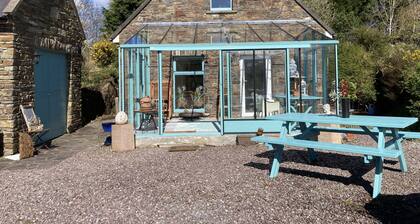 Studio mit großem Wintergarten