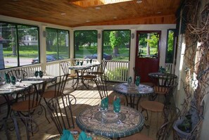 Dinner served, garden views  - The Garrison House Inn (Annapolis Royal)