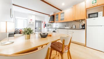 Family Apartment | Living area | 32-inch LCD TV with satellite channels, TV