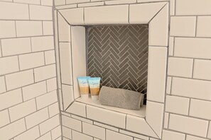 Combined shower/bathtub, hair dryer, towels