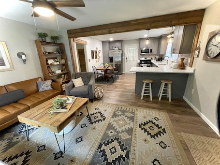 Smart TV, books. Mid-Century Magnolia 1950s Bungalow in Marietta GA