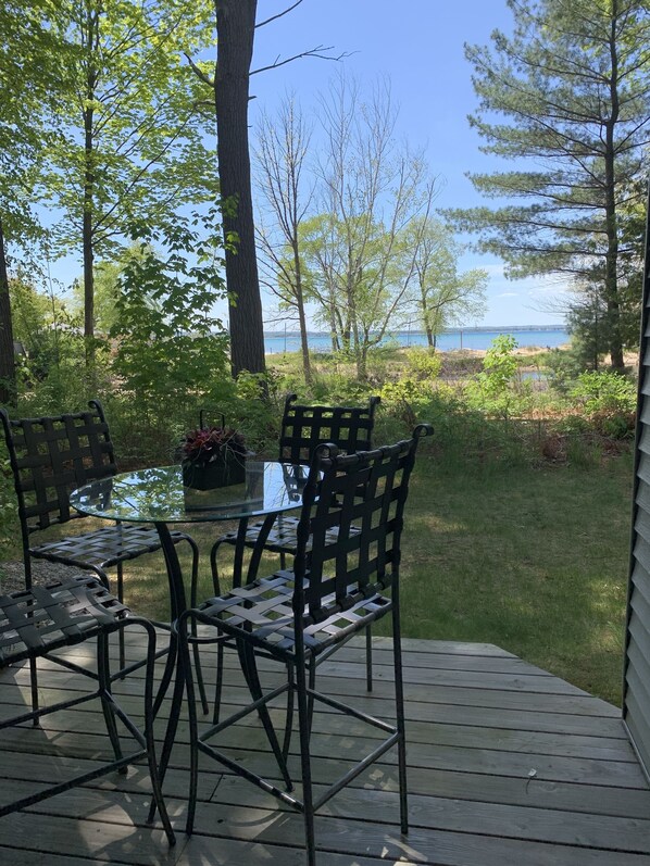 Outdoor dining - 1 bedroom 2 bath condo overlooking Grand Traverse Bay and Acme Creek (Williamsburg)