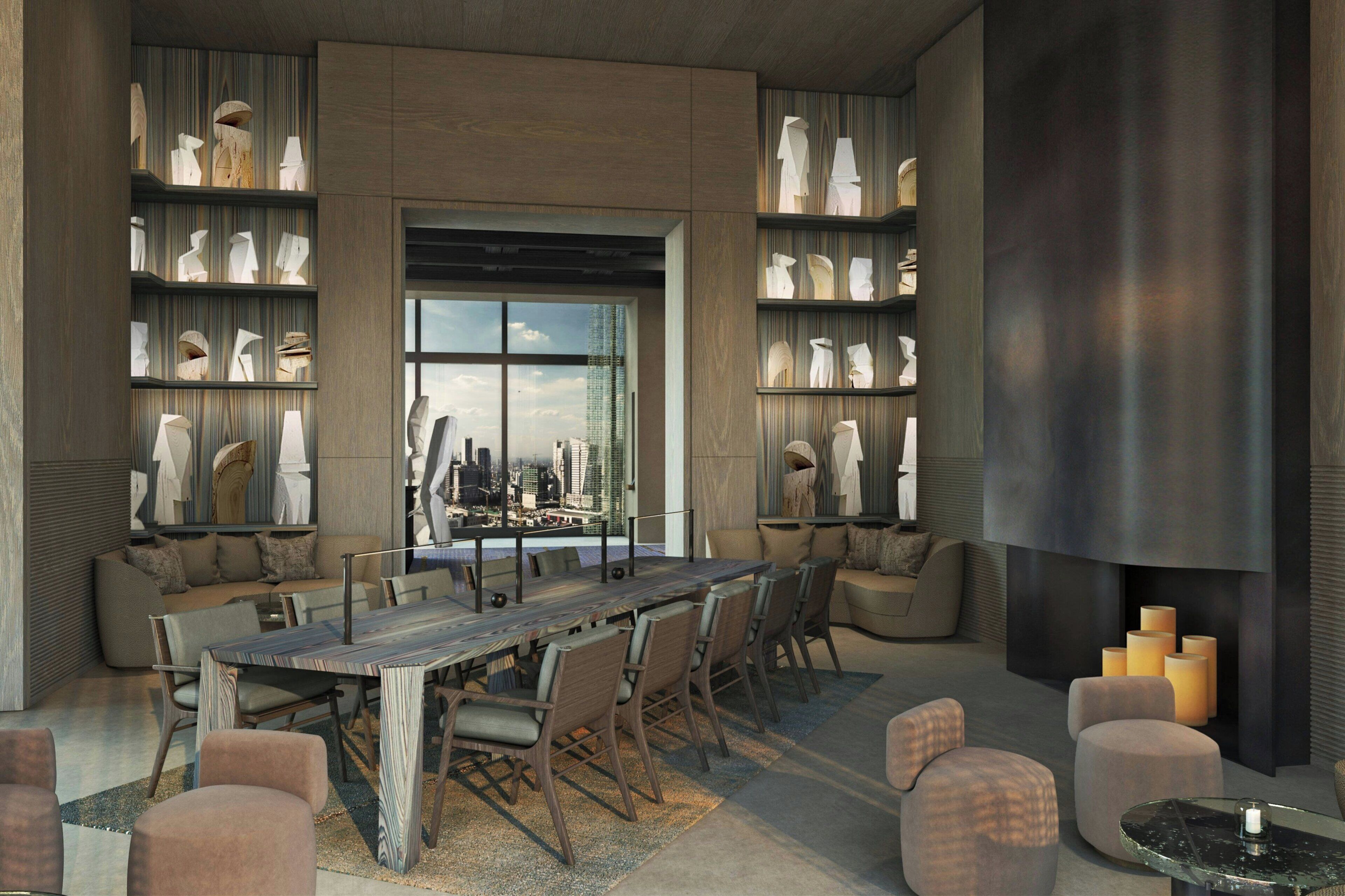 A modern interior with a large dining table, comfortable seating, and bookshelves.