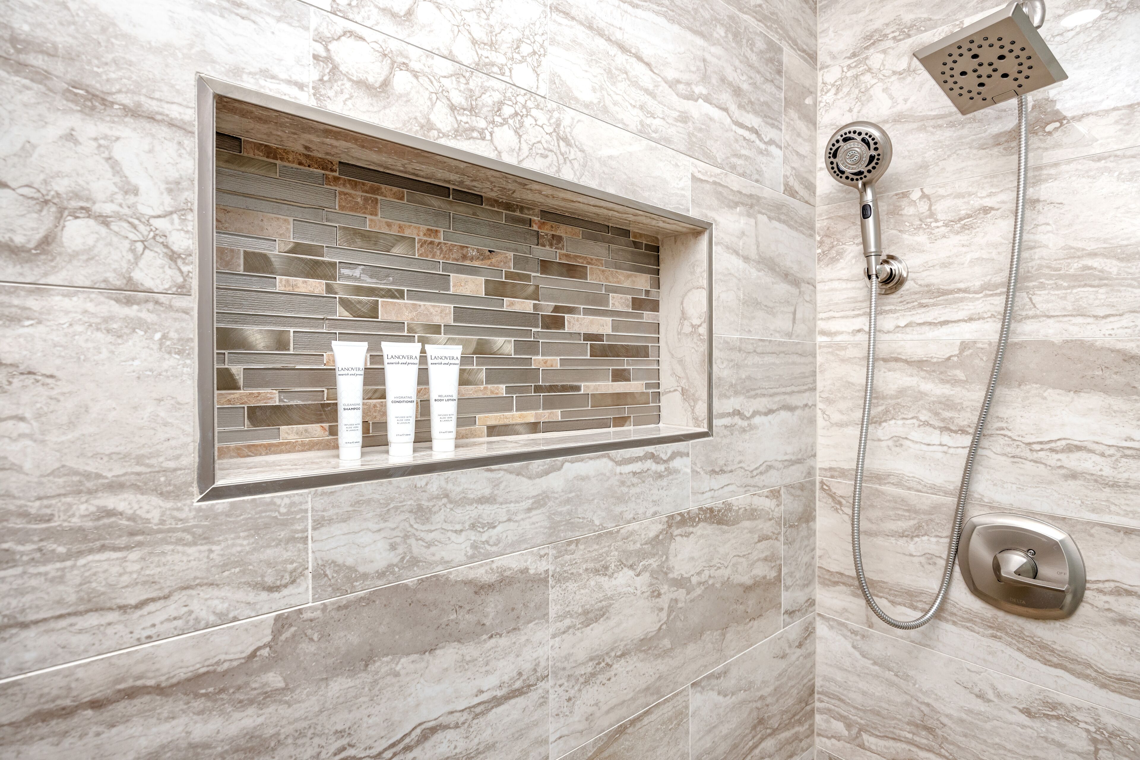 Combined shower/tub, hair dryer, towels, soap