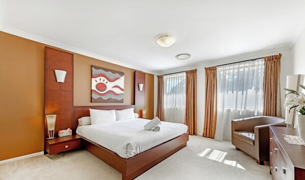 Clean and comfortable bedroom with attached bathroom