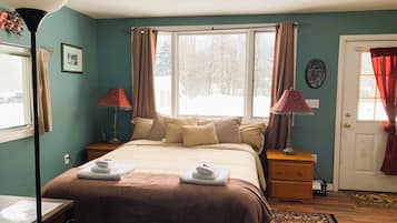 Room, 1 Queen Bed, Kitchenette (Riverfront) | Free WiFi, bed sheets