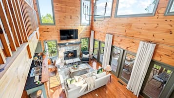 Smart TV, fireplace, books, video library