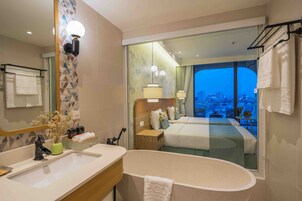 Deluxe City View Double | Bathroom | Designer toiletries, hair dryer, bathrobes, slippers