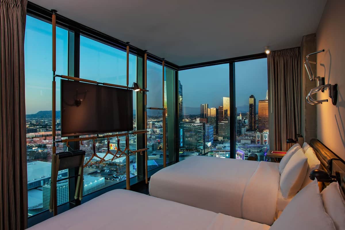 Room, 2 Queen Beds, Corner (View) | In-room safe, desk, laptop workspace, blackout drapes