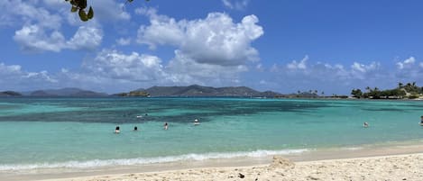 On the beach, sun-loungers, beach towels