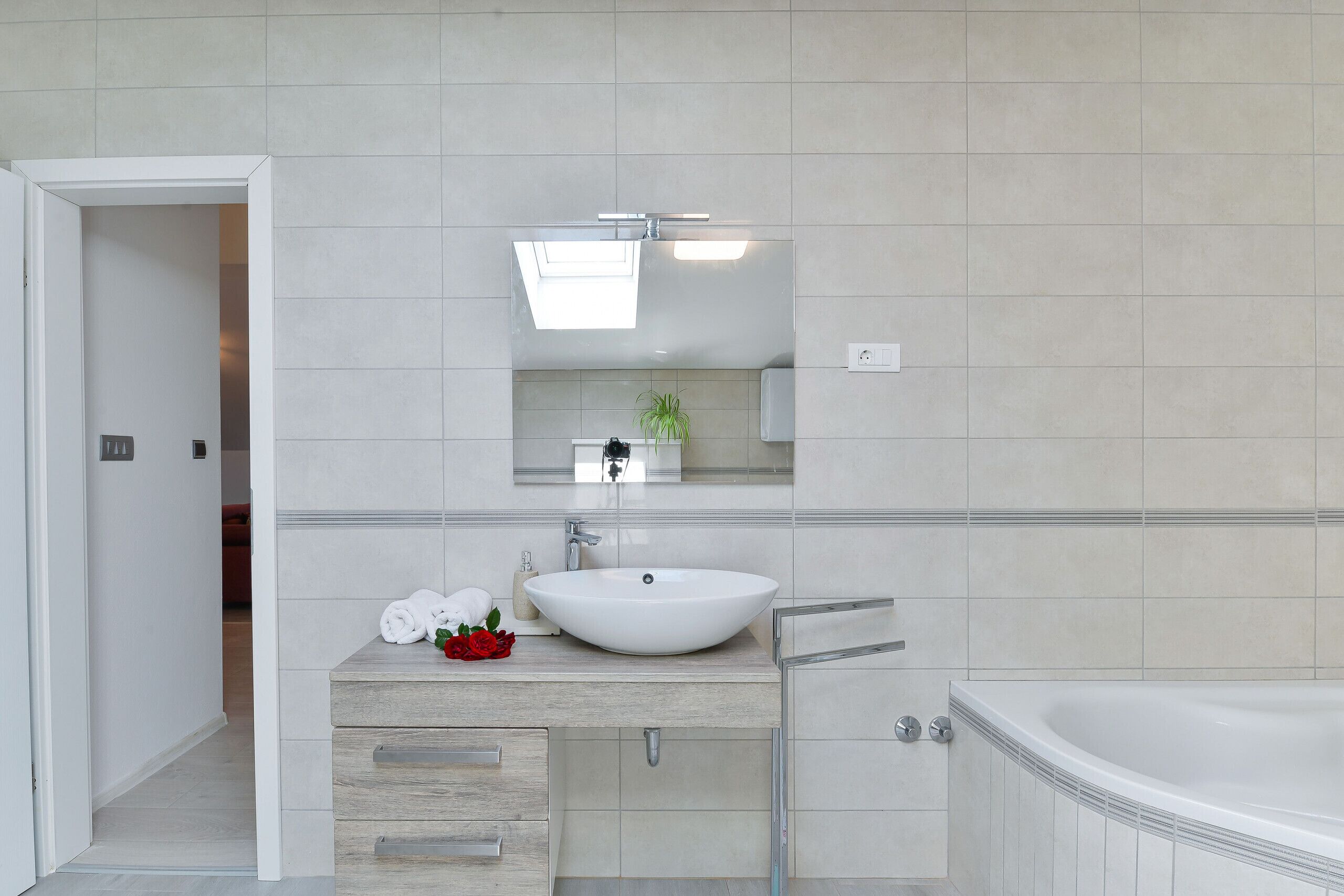 Bathtub, hair dryer, towels