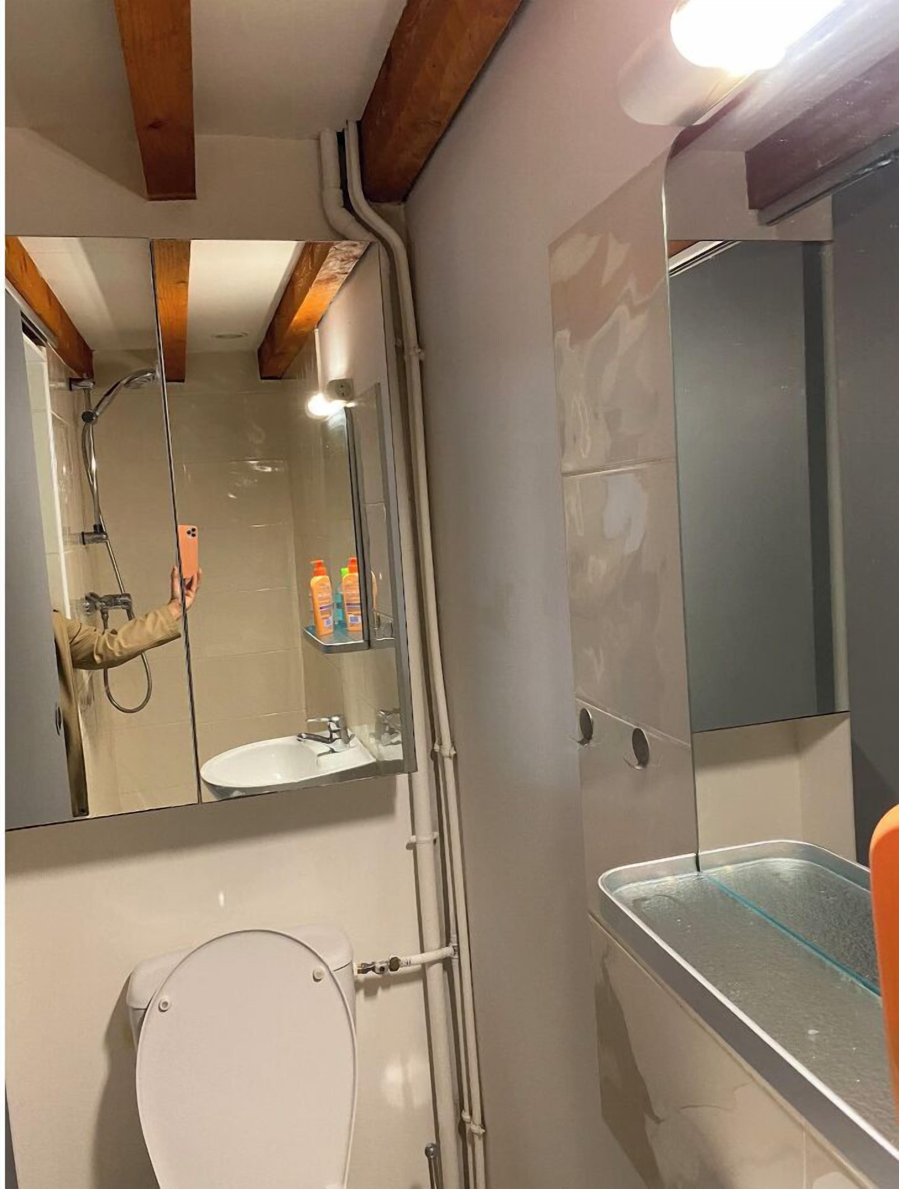 Shower, towels, soap, toilet paper