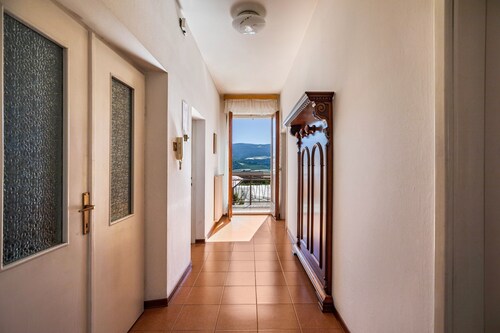 Ferienwohnung 'Melax' mit Bergblick, privatem Garten und Balkon