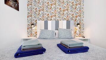 2 slaapkamers, een strijkplank/strijkijzer, gratis wifi, beddengoed