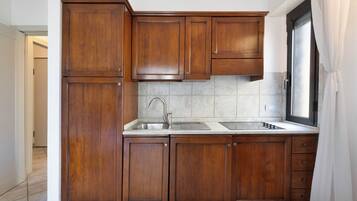 Fridge, stovetop, cookware/dishes/utensils