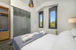 2 عدّة غرف نوم ومكواة/لوح كي وواي فاي مجانًا وملاءات أسرّة